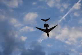 Aircraft Landing In The Sunset