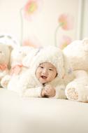 Cute baby in a fluffy bunny suit