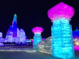 Luminous ice sculptures at night