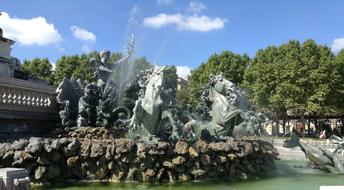 sculptures of horses on the fountain