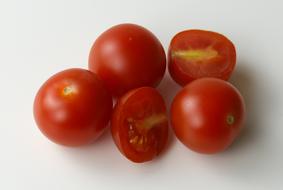 fresh delicious tomatoes on the table