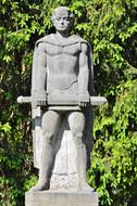 sculpture of a knight with a sword