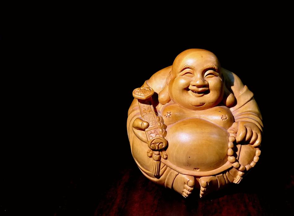 wooden buddha figurine