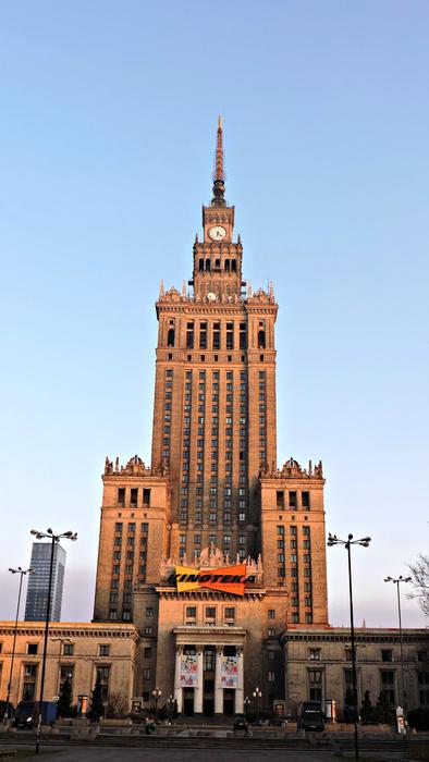 the tower is high against the sky