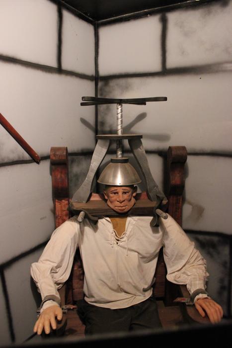 museum exhibit of a torture instrument