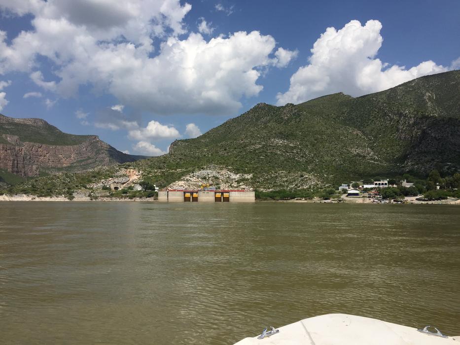 beautiful lake with a view of the house