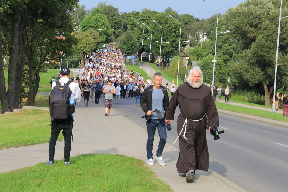 Franciscan Monk ahead of memory walk, lithuania, moletai
