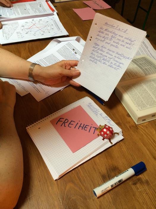 studying the text at the table