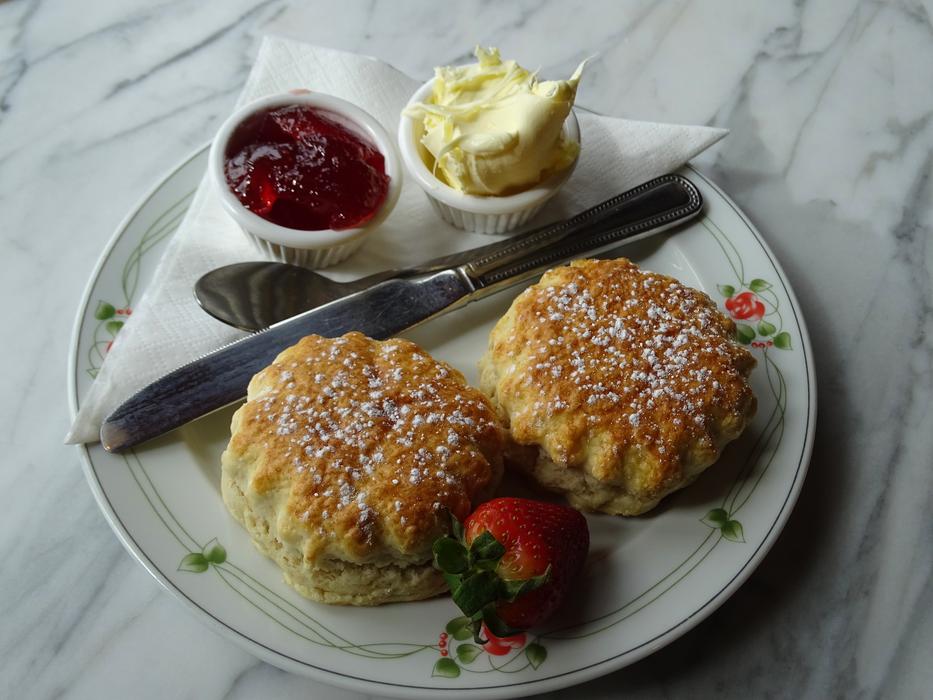 Scones with strawberries and jam