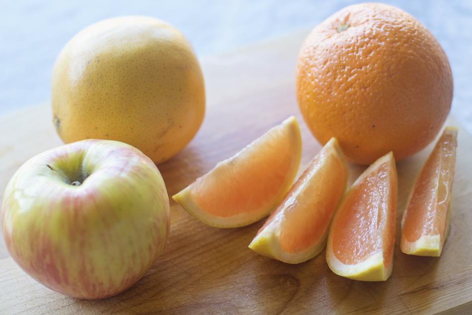 sliced orange and fresh apples