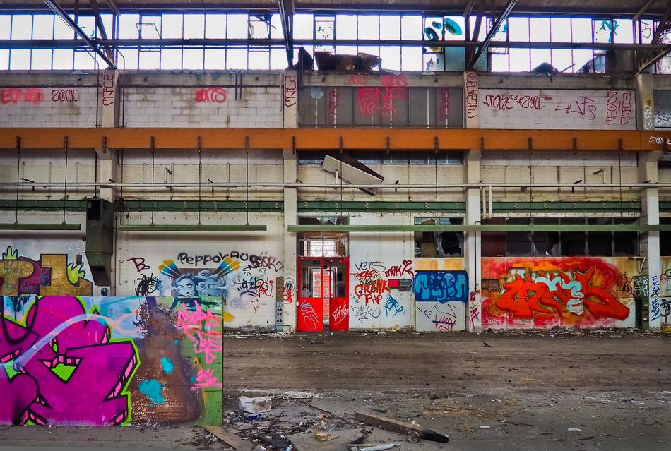 drawings on the wall of an abandoned building