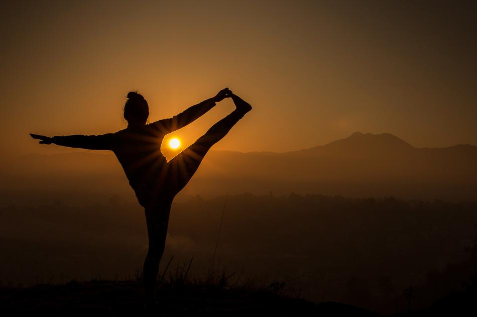 silhouette of a man gymnastics in the evening