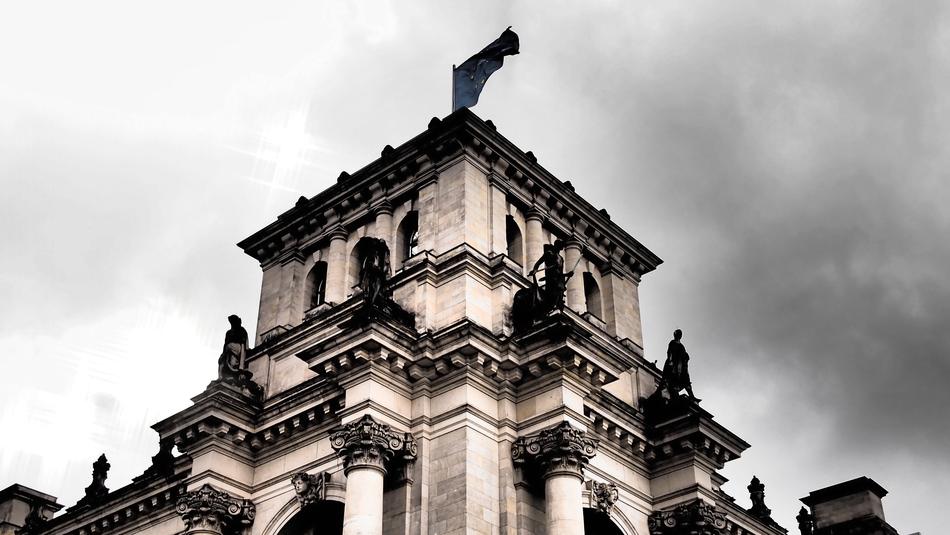 an old building with a beautiful roof