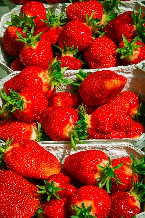 Ripe sweet strawberries in a container