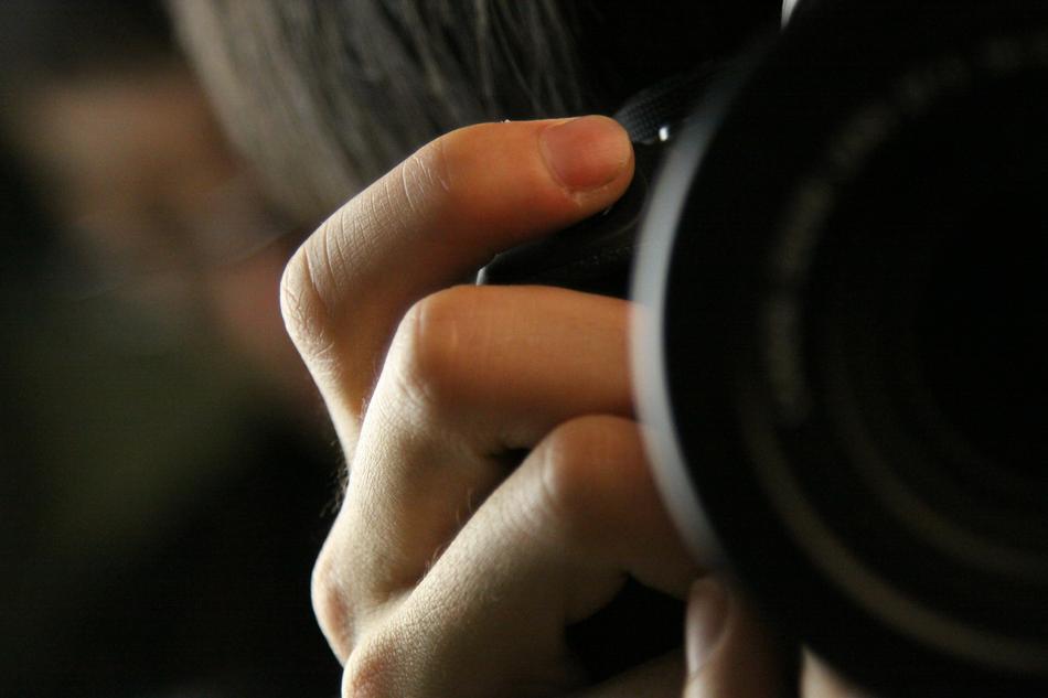 girl holding a camera