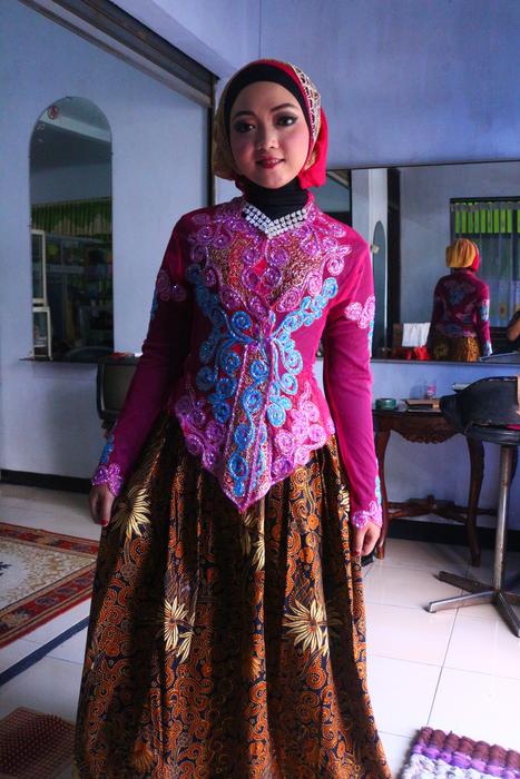 a beautiful girl in a colorful dress
