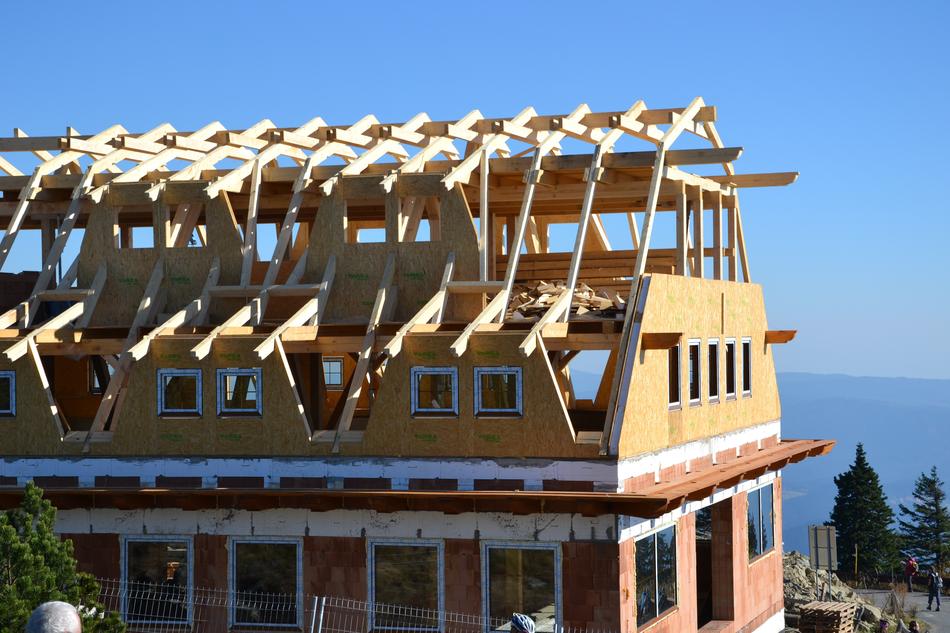 construction of a wooden cottage near the sea