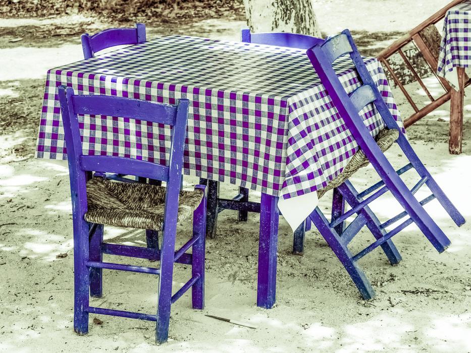 purple chairs with table restaurant
