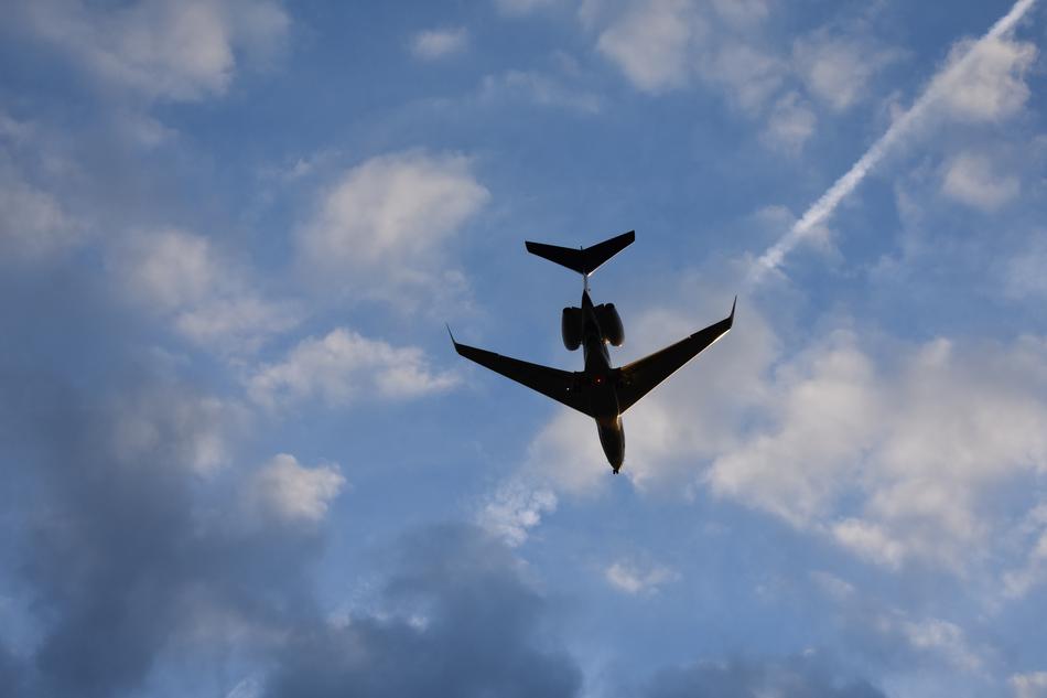 Aircraft Landing In The Sunset