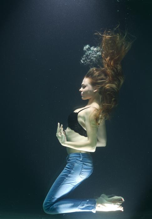 photo of a girl under water