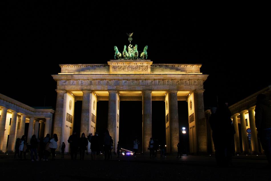 Beautiful Brandenburg Gate, with the colorful lights, in the night, in Berlin, Germany