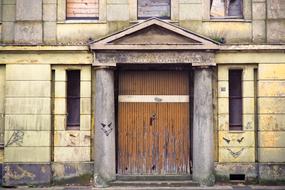 facade of a shabby gloomy house