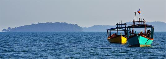 panorama picture of boats in ocean