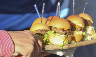 Juicy burgers on tray