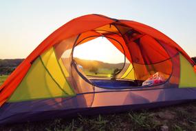 Camping Tent travel at sunset