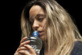 absolutely beautiful Girl drinking Water