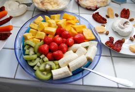 Sweet fruit in a plate of slices