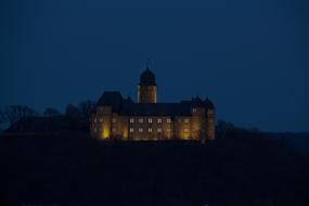 burning castle in the night