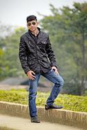 cool young Boy in casual wear posing outdoor