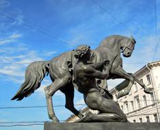 Man Taming Horse, bronze sculpture at sky, russia, st petersburg