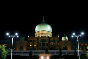 night photo of beautiful mosque in Malaysia