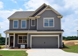 landscape of new gray country house with garage