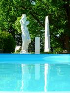 statues set up near the pool