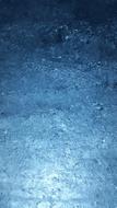 Close-up of the beautiful, shiny, blue and white glazier ice, in light