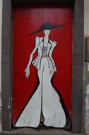 girl in a long dress and a hat