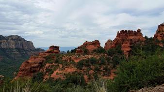 red rocks in the trees in the desert