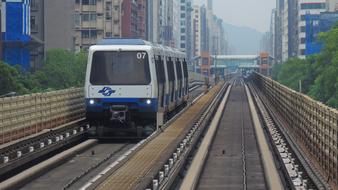 Metro train on railway in city, Taiwan, Taipei