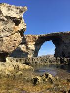 Rocks in the form of an arch by the sea