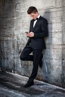 boy suit man wall