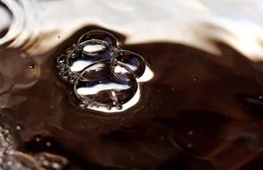 Bubbles on the surface of the coffee