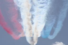 colored smoke from an airplane show