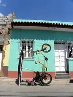 bicycles hitched to the house
