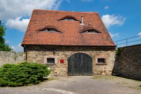 stone building with a gate