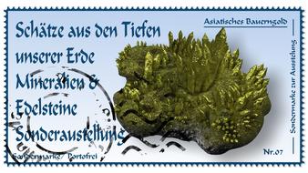 Mineral stones with a signature on a postcard