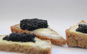 Slices of bread with caviar
