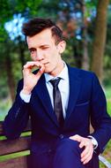 Man Cigarette and Suit